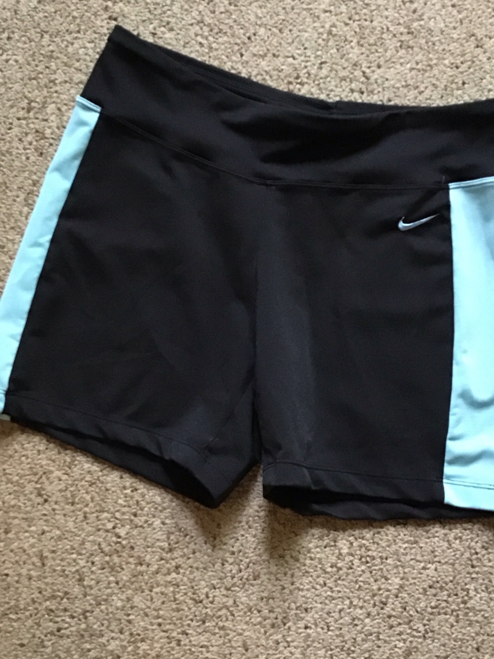Nike Women's Black Athletic Shorts with Light Blue Side Panels